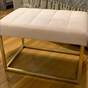 Light pink and gold bench